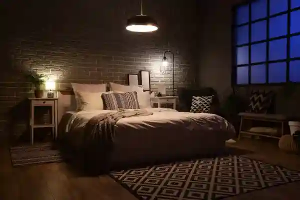 Dormitorio acogedor con iluminación tenue y decoración moderna, ideal para promover un descanso reparador durante la noche